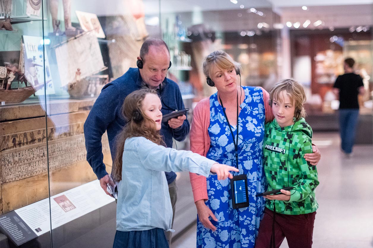 Family at the tour at the Ashmolean Museum with Imagineear devices