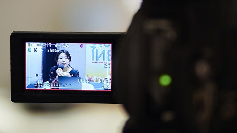 Thai Media Fund Imagineear event woman through a camera lens